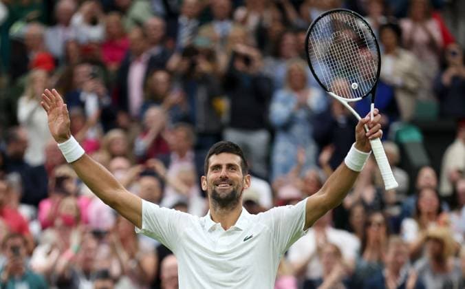 (230715) -- LONDON, July 15, 2023 -- Novak Djokovic celebrates after the men s singles semifinal between Novak Djokovic of Serbia and Jannik Sinner of Italy at Wimbledon tennis Championship in London, Britain, on July 14, 2023. ) (SP)BRITAIN-LONDON-TENNIS-WIMBLEDON-DAY 12 LixYing 