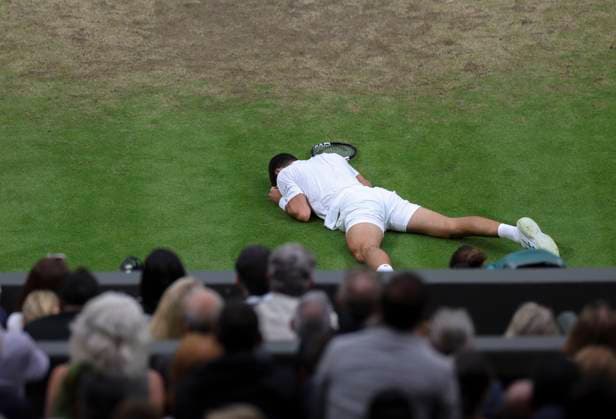 (230715) -- LONDON, July 15, 2023 -- Novak Djokovic reacts during the men s singles semifinal between Novak Djokovic of Serbia and Jannik Sinner of Italy at Wimbledon tennis Championship in London, Britain, on July 14, 2023. ) (SP)BRITAIN-LONDON-TENNIS-WIMBLEDON-DAY 12 HanxYan 