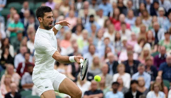 (230715) -- LONDON, July 15, 2023 -- Novak Djokovic competes during the men s singles semifinal between Novak Djokovic of Serbia and Jannik Sinner of Italy at Wimbledon tennis Championship in London, Britain, on July 14, 2023. ) (SP)BRITAIN-LONDON-TENNIS-WIMBLEDON-DAY 12 LixYing 