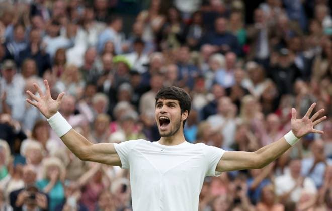 (230715) -- LONDON, July 15, 2023 -- Spain s Carlos Alcaraz celebrates after the men s singles semifinal against Russia s Daniil Medvedev at Wimbledon tennis Championship in London, Britain, on July 14, 2023. ) (SP)BRITAIN-LONDON-TENNIS-WIMBLEDON-DAY 12 LixYing 