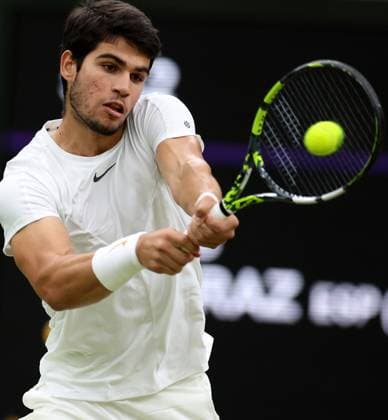 (230715) -- LONDON, July 15, 2023 -- Spain s Carlos Alcaraz competes during the men s singles semifinal against Russia s Daniil Medvedev at Wimbledon tennis Championship in London, Britain, on July 14, 2023. ) (SP)BRITAIN-LONDON-TENNIS-WIMBLEDON-DAY 12 LixYing 