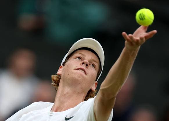 (230715) -- LONDON, July 15, 2023 -- Jannik Sinner serves during the men s singles semifinal between Novak Djokovic of Serbia and Jannik Sinner of Italy at Wimbledon tennis Championship in London, Britain, on July 14, 2023. ) (SP)BRITAIN-LONDON-TENNIS-WIMBLEDON-DAY 12 LixYing 