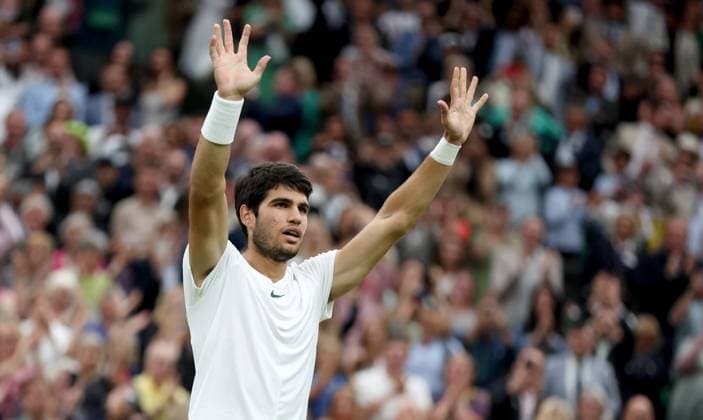 (230715) -- LONDON, July 15, 2023 -- Spain s Carlos Alcaraz celebrates after the men s singles semifinal against Russia s Daniil Medvedev at Wimbledon tennis Championship in London, Britain, on July 14, 2023. ) (SP)BRITAIN-LONDON-TENNIS-WIMBLEDON-DAY 12 LixYing 