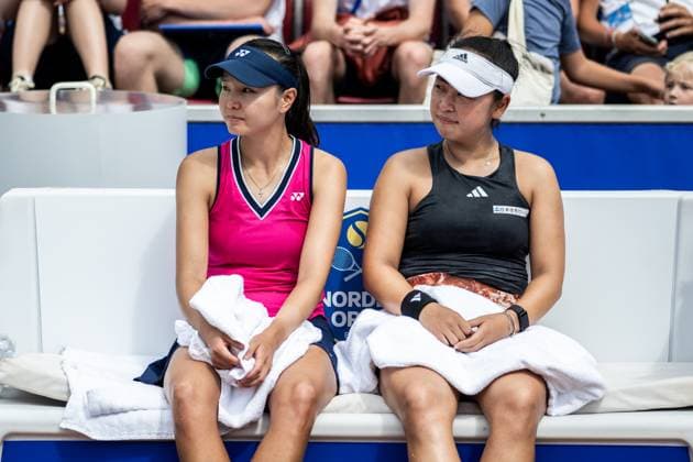 230715 Su Jeong Jang, Korea, and Eri Hozumi, Japan, deflate after the womens doubles final during day 6 of the WTA Nordea Open on July 15, 2023 in Bastad, Sweden.  Copyright: NICLASxJÖNSSON BB230715NO018