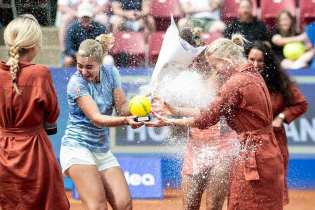 230715 Irina Khromacheva, of Russia, and Panna Udvardy, of Hungary, celebrate after the womens doubles final during day 6 of the WTA Nordea Open on July 15, 2023 in Bastad, Sweden.  Copyright: NICLASxJÖNSSON BB230715NO020