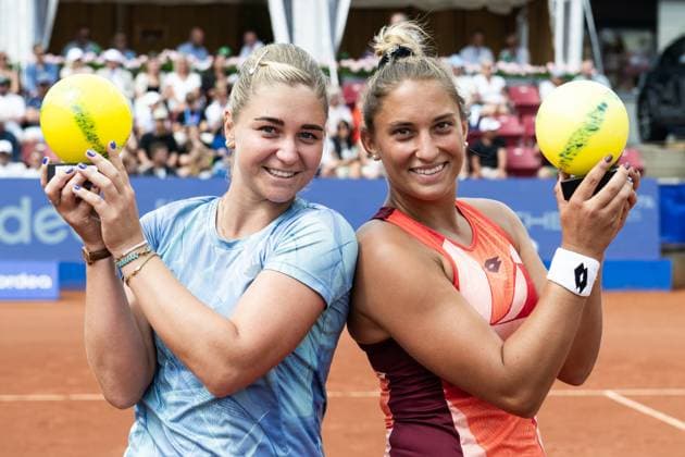 230715 Irina Khromacheva, of Russia, and Panna Udvardy, of Hungary, cheer after the womens doubles final during day 6 of the WTA Nordea Open on July 15, 2023 in Bastad, Sweden  Copyright: NICLASxJÖNSSON BB230715NO021
