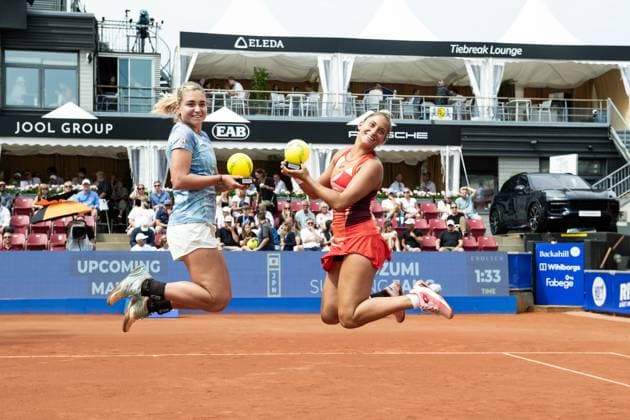 230715 Irina Khromacheva, of Russia, and Panna Udvardy, of Hungary, cheer after the womens doubles final during day 6 of the WTA Nordea Open on July 15, 2023 in Bastad, Sweden  Copyright: NICLASxJÖNSSON BB230715NO022