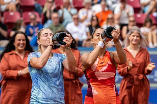 230715 Irina Khromacheva, of Russia, and Panna Udvardy, of Hungary, celebrate after the womens doubles final during day 6 of the WTA Nordea Open on July 15, 2023 in Bastad.  Copyright: NICLASxJÖNSSON BB230715NO030