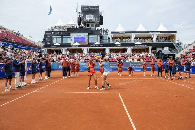 230715 Panna Udvardy, of Hungary, and Irina Khromacheva, of Russia, cheer after the womens doubles final during day 6 of the WTA Nordea Open on July 15, 2023 in Bastad, Sweden  Copyright: NICLASxJÖNSSON BB230715NO036