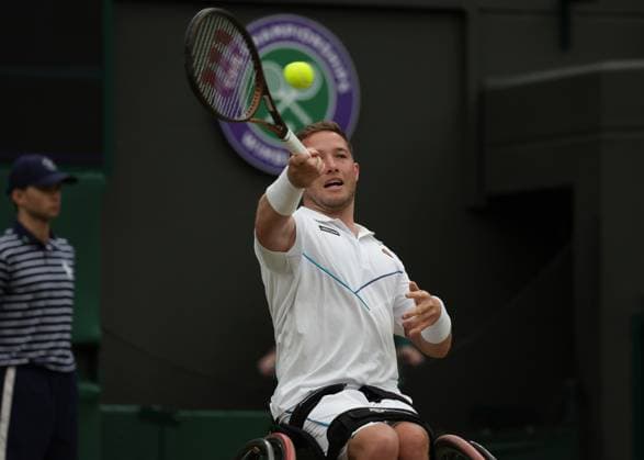 15th July 2023; All England Lawn Tennis and Croquet Club, London, England: Wimbledon Tennis Tournament; Alfie& xa0;Hewett (GBR) with a forehand shot to De La Puente (ESP) , mens wheelchair singles semi-final  ActionPlus12531399 JohnxPatrickxFletcher
