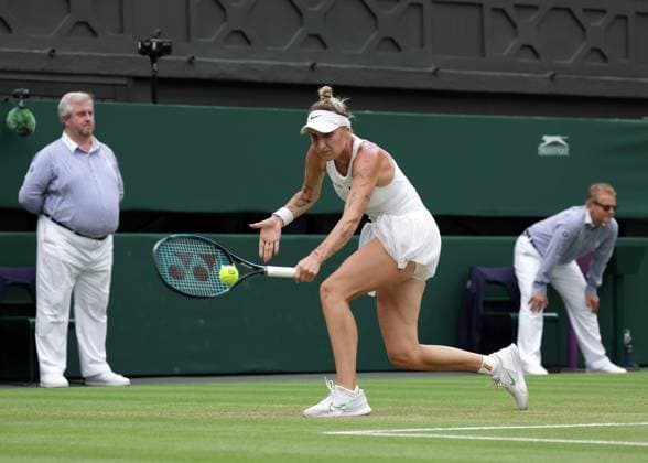 15th July 2023; All England Lawn Tennis and Croquet Club, London, England: Wimbledon Tennis Tournament; Womens singles final match, Marketa Vondrousova versus Ons Jabeur on centre court; Marketa Vondrousova (CZE) with a backhand shot to Ons Jabeur (TUN)  ActionPlus12531538 JohnxPatrickxFletcher