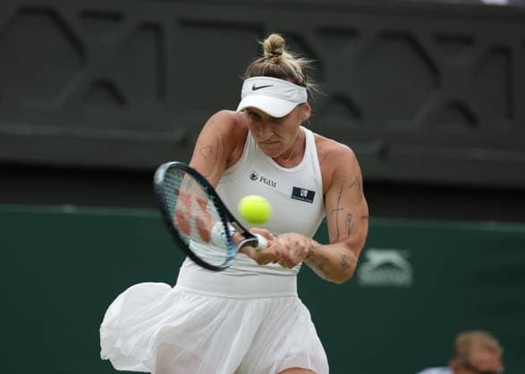 15th July 2023; All England Lawn Tennis and Croquet Club, London, England: Wimbledon Tennis Tournament; Womens singles final match, Marketa Vondrousova versus Ons Jabeur on centre court; Marketa Vondrousova (CZE) with a backhand shot to Ons Jabeur (TUN)  ActionPlus12531540 JohnxPatrickxFletcher