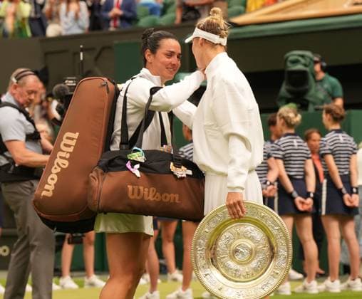 Tennis - 2023 Wimbledon Championships - Week Two - Day Thirteen - All England lawn Tennis & Racquet Club, Wimbledon -Saturday 15th Ladies final - Marketa Vondrousova (CZE) v Ons Jabeur (TUN) Marketa Vondrousova consoles Ons Jabeur as she walks off court 