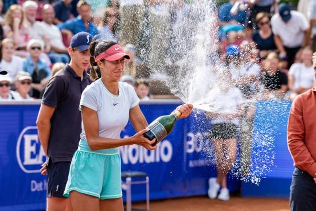 230715 Olga Danilovic, Serbia sprays champagne after the womens final during day 6 of the WTA Nordea Open on July 15, 2023 in Bastad, Sweden  Copyright: NICLASxJÖNSSON BB230715NO089