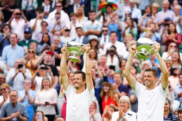 Mandatory Credit: Photo by Javier Garcia Shutterstock (14010521hq) Wesley Koolhof and Neal Skupski celebrate victory in the Gentlemen s Dobles final Wimbledon Tennis Championships, Day 13, The All England Lawn Tennis and Croquet Club, London, UK - 15 Jul 2023 Wimbledon Tennis Championships, Day 13, The All England Lawn Tennis and Croquet Club, London, UK - 15 Jul 2023  Copyright: xJavierxGarcia Shutterstockx 14010521hq