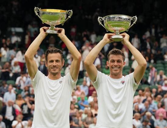 Tennis - 2023 Wimbledon Championships - Week Two - Day Thirteen - All England lawn Tennis & Racquet Club, Wimbledon -Saturday 15th Mens Doubles final - Wesley Koolhof (NED) and Neal Skupski (GBR) v Marcel Granollers (ESP) and Horacio Zeballos (ARG) Wesley Koolhof (NED) and Neal Skupski (GBR) with their winners trophies 