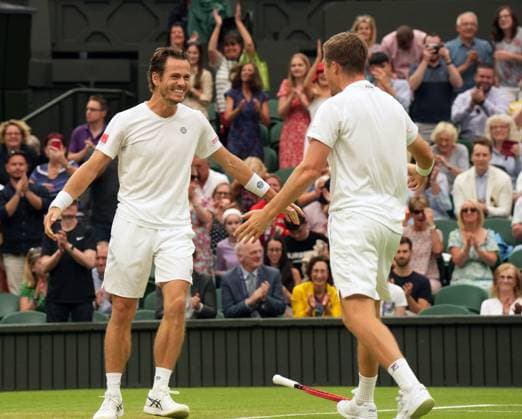 Tennis - 2023 Wimbledon Championships - Week Two - Day Thirteen - All England lawn Tennis & Racquet Club, Wimbledon -Saturday 15th Mens Doubles final - Wesley Koolhof (NED) and Neal Skupski (GBR) v Marcel Granollers (ESP) and Horacio Zeballos (ARG) Wesley Koolhof (NED) and Neal Skupski (GBR) celebrate winning match point 