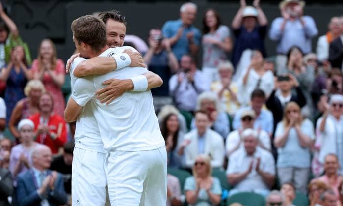 (230716) -- LONDON, July 16, 2023 -- Wesley Koolhof (rear) Neal Skupski celebrate after the men s doubles final match between Wesley Koolhof of the Netherlands Neal Skupski of Britain and Marcel Granollers of Spain Horacio Zeballos of Argentina at Wimbledon tennis Championship in London, Britain, on July 15, 2023. ) (SP)BRITAIN-LONDON-TENNIS-WIMBLEDON-MEN S DOUBLES-FINAL LixYing 