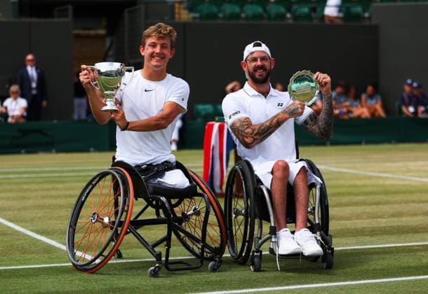 Mandatory Credit: Photo by Ella Ling Shutterstock (14011309n) Niels Vink wins in the Quad Wheelchair singles final and celebrates with the trophy and with finalist Heath Davidson Wimbledon Tennis Championships, Day 14, The All England Lawn Tennis and Croquet Club, London, UK - 16 Jul 2023 Wimbledon Tennis Championships, Day 14, The All England Lawn Tennis and Croquet Club, London, UK - 16 Jul 2023  Copyright: xEllaxLing Shutterstockx 14011309n