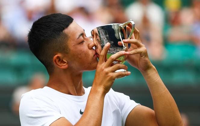 Mandatory Credit: Photo by Kieran McManus Shutterstock (14011306v) Tokito Oda wins the Mens Wheelchair Singles final and celebrates with the trophy Wimbledon Tennis Championships, Day 14, The All England Lawn Tennis and Croquet Club, London, UK - 16 Jul 2023 Wimbledon Tennis Championships, Day 14, The All England Lawn Tennis and Croquet Club, London, UK - 16 Jul 2023  Copyright: xKieranxMcManus Shutterstockx 14011306v