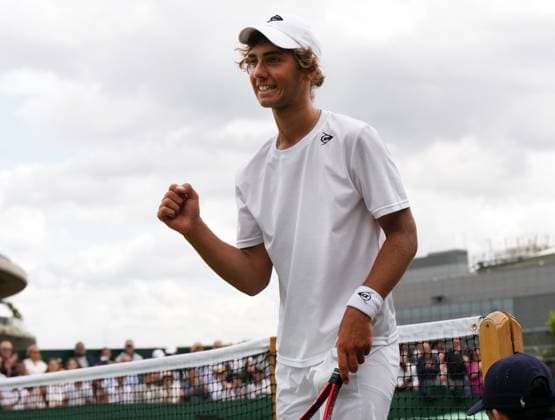 Tennis - 2023 Wimbledon Championships - Week Two - Day Fourteen - All England lawn Tennis & Racquet Club, Wimbledon - Sunday 16th Boys singles U™14 final - Mark Cuban (GBR) v Svit Suljic (SLO) Mark Cuban (GBR) celebrates winning the match 