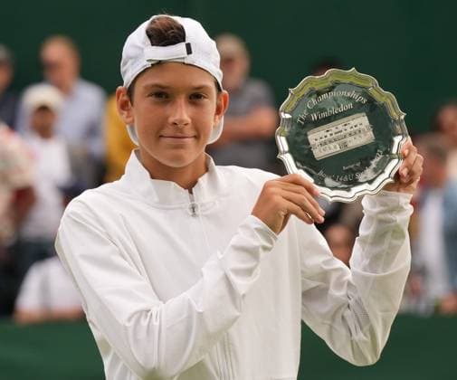 Tennis - 2023 Wimbledon Championships - Week Two - Day Fourteen - All England lawn Tennis & Racquet Club, Wimbledon - Sunday 16th Boys singles U™14 final - Mark Cuban (GBR) v Svit Suljic (SLO) Svit Suljic (SLO) with his runners up plate 