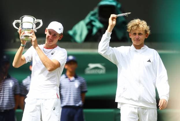 Mandatory Credit: Photo by Kieran McManus Shutterstock (14011306az) Henry Searle celebrates after winning the Mens Junior Singles Title at Wimbledon with finalist Yaroslav Demin Wimbledon Tennis Championships, Day 14, The All England Lawn Tennis and Croquet Club, London, UK - 16 Jul 2023 Wimbledon Tennis Championships, Day 14, The All England Lawn Tennis and Croquet Club, London, UK - 16 Jul 2023  Copyright: xKieranxMcManus Shutterstockx 14011306az