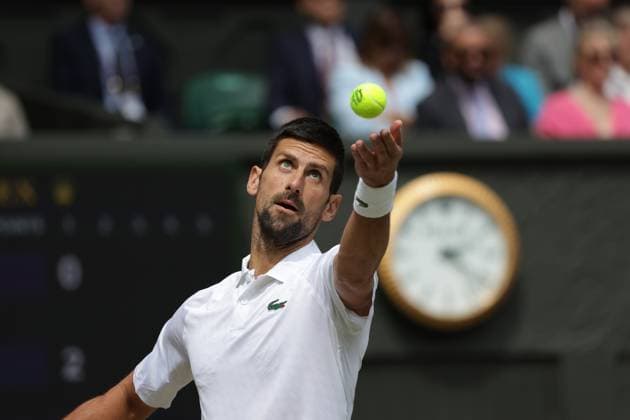 16th July 2023; All England Lawn Tennis and Croquet Club, London, England: Wimbledon Tennis Tournament; Mens singles final on centre court: Novak Djokovic serves to Carlos Alcaraz in 1st set as he breaks serve twice  ActionPlus12531941 JohnxPatrickxFletcher