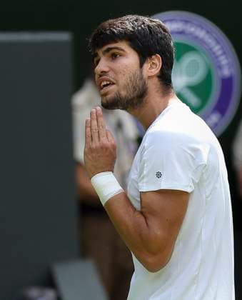(230716) -- LONDON, July 16, 2023 -- Carlos Alcaraz reacts during the men s singles final match between Novak Djokovic of Serbia and Carlos Alcaraz of spain at Wimbledon Tennis Championships in London, Britain, July 16, 2023. ) (SP)BRITAIN-LONDON-TENNIS-WIMBLEDON-DAY 14 HanxYan 
