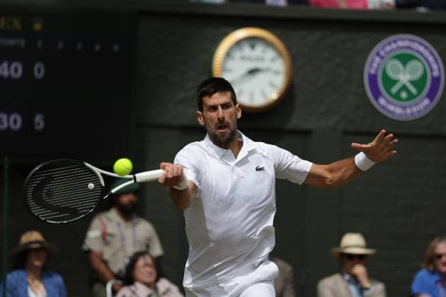 16th July 2023; All England Lawn Tennis and Croquet Club, London, England: Wimbledon Tennis Tournament; Mens singles final on centre court Novak Djokovic versus Carlos Alcaraz; Djokovic returns to Alcaraz  ActionPlus12531974 JohnxPatrickxFletcher