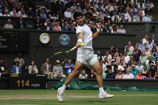 16th July 2023; All England Lawn Tennis and Croquet Club, London, England: Wimbledon Tennis Tournament; Mens singles final on centre court Novak Djokovic versus Carlos Alcaraz; Alcaraz returns  ActionPlus12531978 JohnxPatrickxFletcher