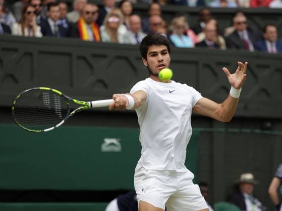 16th July 2023; All England Lawn Tennis and Croquet Club, London, England: Wimbledon Tennis Tournament; Mens singles final on centre court Novak Djokovic versus Carlos Alcaraz; Alcaraz returns  ActionPlus12532008 JohnxPatrickxFletcher