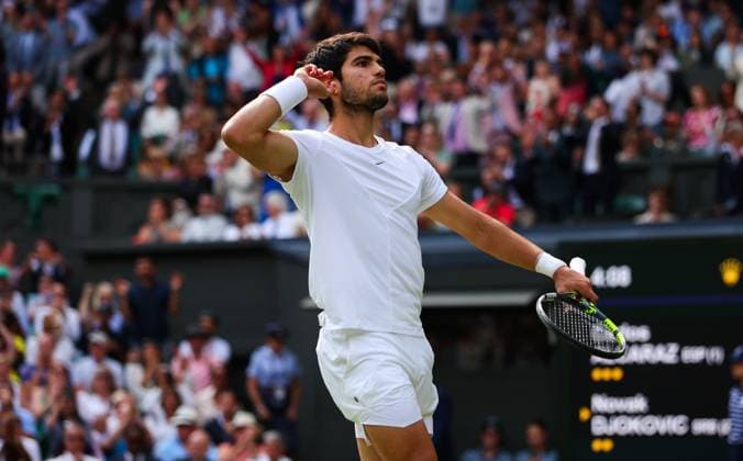 Mandatory Credit: Photo by Ella Ling Shutterstock (14011309ds) Carlos Alcaraz celebrates after winning the second set tie break Wimbledon Tennis Championships, Day 14, The All England Lawn Tennis and Croquet Club, London, UK - 16 Jul 2023 Wimbledon Tennis Championships, Day 14, The All England Lawn Tennis and Croquet Club, London, UK - 16 Jul 2023  Copyright: xEllaxLing Shutterstockx 14011309ds