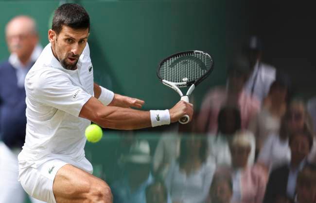 Sport Bilder des Tages (230716) -- LONDON, July 16, 2023 -- Novak Djokovic hits a return during the men s singles final match between Novak Djokovic of Serbia and Carlos Alcaraz of spain at Wimbledon Tennis Championships in London, Britain, July 16, 2023. ) (SP)BRITAIN-LONDON-TENNIS-WIMBLEDON-DAY 14 HanxYan 