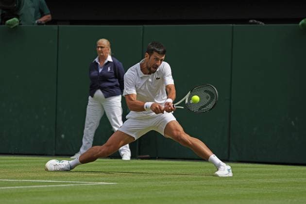 16th July 2023; All England Lawn Tennis and Croquet Club, London, England: Wimbledon Tennis Tournament; Mens singles final on centre court Novak Djokovic versus Carlos Alcaraz; Djokovic returns  ActionPlus12532011 JohnxPatrickxFletcher