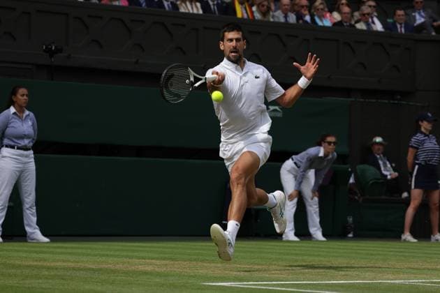 16th July 2023; All England Lawn Tennis and Croquet Club, London, England: Wimbledon Tennis Tournament; Mens singles final on centre court Novak Djokovic versus Carlos Alcaraz; Djokovic returns  ActionPlus12532017 JohnxPatrickxFletcher