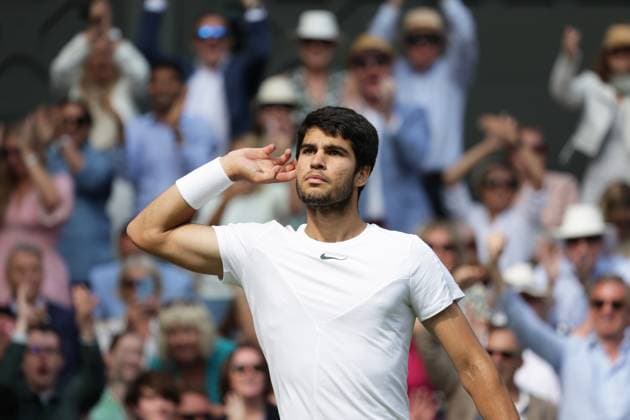 16th July 2023; All England Lawn Tennis and Croquet Club, London, England: Wimbledon Tennis Tournament; Mens singles final on centre court Novak Djokovic versus Carlos Alcaraz; Alcaraz wins an important point and celebrates  ActionPlus12532035 JohnxPatrickxFletcher