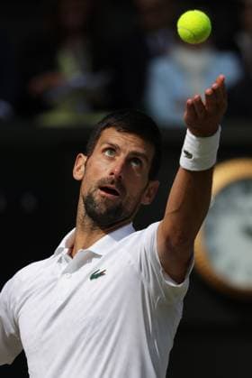 16th July 2023; All England Lawn Tennis and Croquet Club, London, England: Wimbledon Tennis Tournament; Mens singles final on centre court Novak Djokovic versus Carlos Alcaraz; Djokovic serves  ActionPlus12532039 JohnxPatrickxFletcher