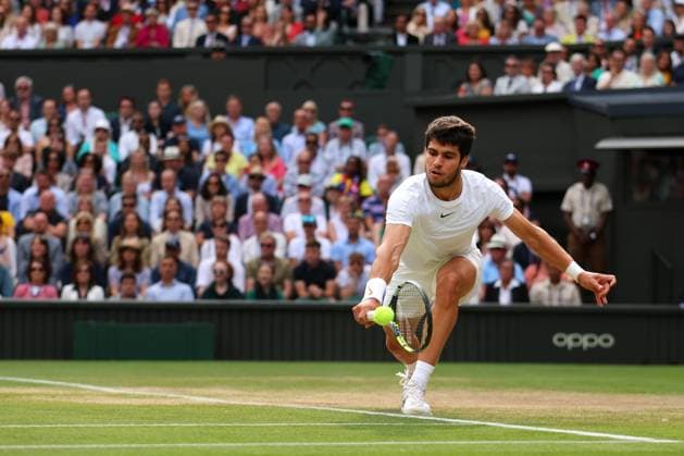 Mandatory Credit: Photo by Ella Ling Shutterstock (14011309fs) Carlos Alcaraz during the Men s Singles final Wimbledon Tennis Championships, Day 14, The All England Lawn Tennis and Croquet Club, London, UK - 16 Jul 2023 Wimbledon Tennis Championships, Day 14, The All England Lawn Tennis and Croquet Club, London, UK - 16 Jul 2023  Copyright: xEllaxLing Shutterstockx 14011309fs
