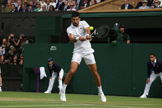 16th July 2023; All England Lawn Tennis and Croquet Club, London, England: Wimbledon Tennis Tournament; Mens singles final on centre court Novak Djokovic versus Carlos Alcaraz; Djokovic returns  ActionPlus12532044 JohnxPatrickxFletcher