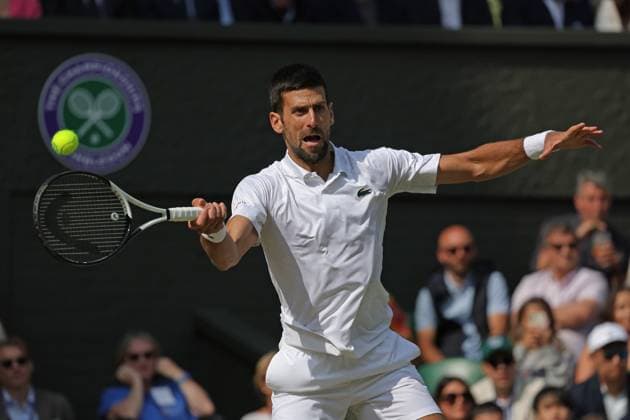16th July 2023; All England Lawn Tennis and Croquet Club, London, England: Wimbledon Tennis Tournament; Mens singles final on centre court Novak Djokovic versus Carlos Alcaraz; Djokovic returns  ActionPlus12532056 JohnxPatrickxFletcher