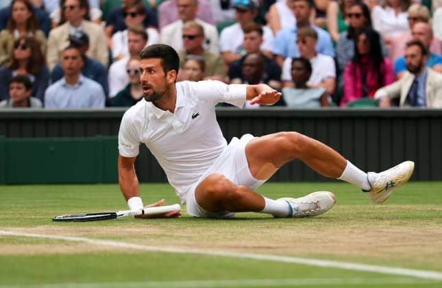 Mandatory Credit: Photo by Ella Ling Shutterstock (14011309gd) Novak Djokovic falls during the Men s Singles final Wimbledon Tennis Championships, Day 14, The All England Lawn Tennis and Croquet Club, London, UK - 16 Jul 2023 Wimbledon Tennis Championships, Day 14, The All England Lawn Tennis and Croquet Club, London, UK - 16 Jul 2023  Copyright: xEllaxLing Shutterstockx 14011309gd