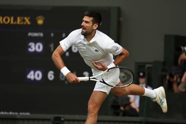 16th July 2023; All England Lawn Tennis and Croquet Club, London, England: Wimbledon Tennis Tournament; Mens singles final on centre court Novak Djokovic versus Carlos Alcaraz; Djokov returns  ActionPlus12532088 JohnxPatrickxFletcher