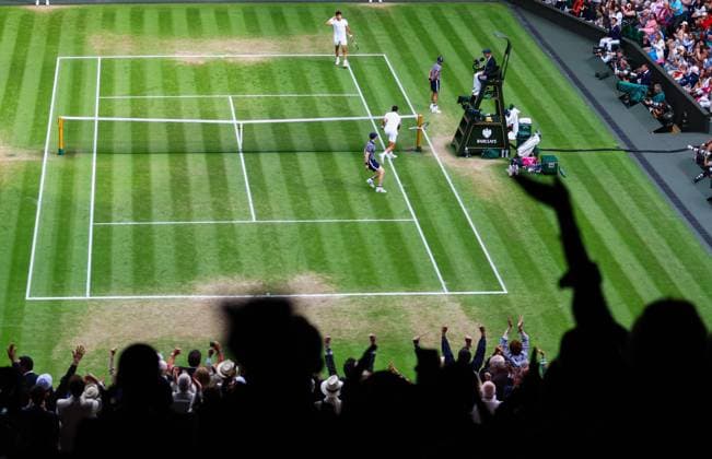 Mandatory Credit: Photo by Kieran McManus Shutterstock (14011306cw) Novak Djokovic smashes his racket into the net post as the crowd celebrate the Carlos Alcaraz break Wimbledon Tennis Championships, Day 14, The All England Lawn Tennis and Croquet Club, London, UK - 16 Jul 2023 Wimbledon Tennis Championships, Day 14, The All England Lawn Tennis and Croquet Club, London, UK - 16 Jul 2023  Copyright: xKieranxMcManus Shutterstockx 14011306cw