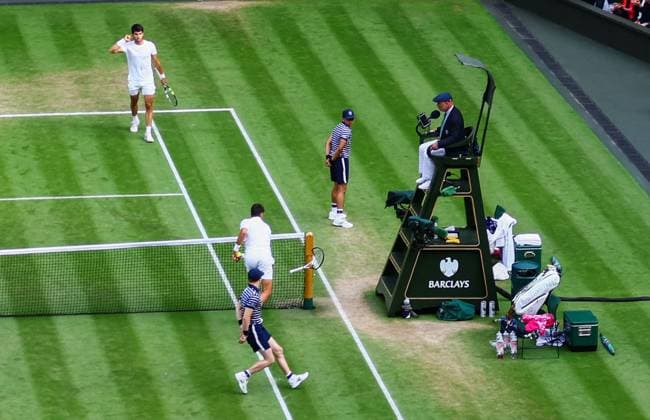 Mandatory Credit: Photo by Kieran McManus Shutterstock (14011306db) Novak Djokovic smashes his racket into the net post as the crowd celebrate the Carlos Alcaraz break Wimbledon Tennis Championships, Day 14, The All England Lawn Tennis and Croquet Club, London, UK - 16 Jul 2023 Wimbledon Tennis Championships, Day 14, The All England Lawn Tennis and Croquet Club, London, UK - 16 Jul 2023  Copyright: xKieranxMcManus Shutterstockx 14011306db