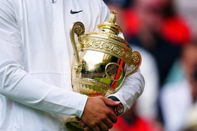 Mandatory Credit: Photo by Javier Garcia Shutterstock (14011311jn) Carlos Alcaraz lifts the The Gentlemen s Singles Trophy after victory Wimbledon Tennis Championships, Day 14, The All England Lawn Tennis and Croquet Club, London, UK - 16 Jul 2023 Wimbledon Tennis Championships, Day 14, The All England Lawn Tennis and Croquet Club, London, UK - 16 Jul 2023  Copyright: xJavierxGarcia Shutterstockx 14011311jn