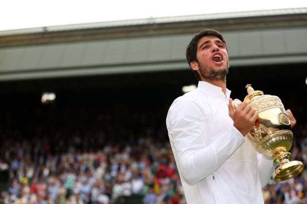 Mandatory Credit: Photo by Ella Ling Shutterstock (14011309hk) Carlos Alcaraz lifts the The Gentlemen s Singles Trophy after victory Wimbledon Tennis Championships, Day 14, The All England Lawn Tennis and Croquet Club, London, UK - 16 Jul 2023 Wimbledon Tennis Championships, Day 14, The All England Lawn Tennis and Croquet Club, London, UK - 16 Jul 2023  Copyright: xEllaxLing Shutterstockx 14011309hk