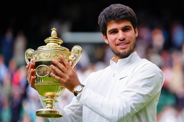 Mandatory Credit: Photo by Javier Garcia Shutterstock (14011311ke) Carlos Alcaraz lifts the The Gentlemen s Singles Trophy after victory Wimbledon Tennis Championships, Day 14, The All England Lawn Tennis and Croquet Club, London, UK - 16 Jul 2023 Wimbledon Tennis Championships, Day 14, The All England Lawn Tennis and Croquet Club, London, UK - 16 Jul 2023  Copyright: xJavierxGarcia Shutterstockx 14011311ke