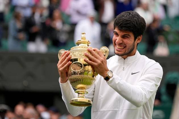 Mandatory Credit: Photo by Dave Shopland Shutterstock (14011307jl) Carlos Alcaraz lifts the The Gentlemen s Singles Trophy after victory Wimbledon Tennis Championships, Day 14, The All England Lawn Tennis and Croquet Club, London, UK - 16 Jul 2023 Wimbledon Tennis Championships, Day 14, The All England Lawn Tennis and Croquet Club, London, UK - 16 Jul 2023  Copyright: xDavexShopland Shutterstockx 14011307jl
