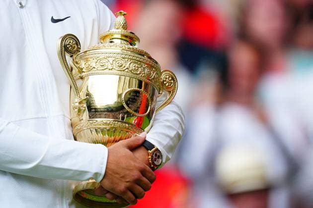 Mandatory Credit: Photo by Javier Garcia Shutterstock (14011311lo) Carlos Alcaraz lifts the The Gentlemen s Singles Trophy after victory Wimbledon Tennis Championships, Day 14, The All England Lawn Tennis and Croquet Club, London, UK - 16 Jul 2023 Wimbledon Tennis Championships, Day 14, The All England Lawn Tennis and Croquet Club, London, UK - 16 Jul 2023  Copyright: xJavierxGarcia Shutterstockx 14011311lo